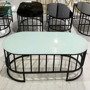 ban-sofa-cu-mat-kinh-xanh-chan-sat-den-bau-duc