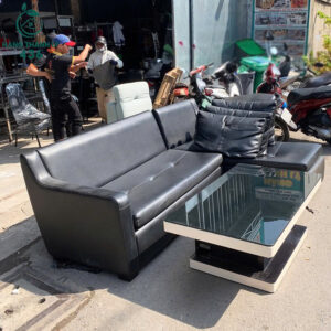 sofa-goc-da-mau-den-kem-don-nam-cu